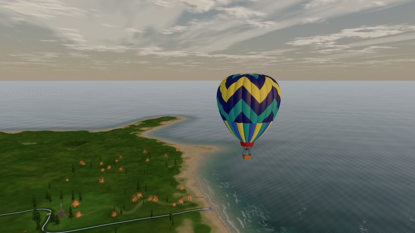 The balloon over a long sandy peninsula, surf on the shore and open sea beyond